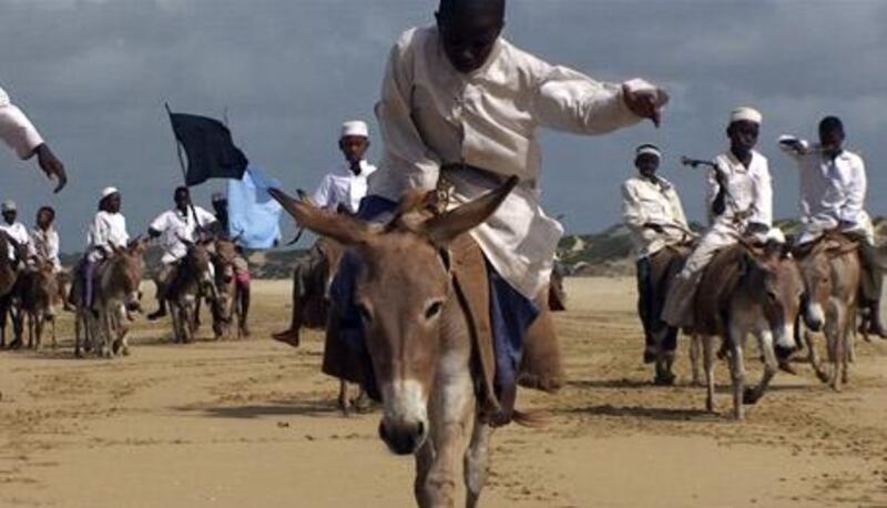 A still from Wael Shawky's 13-minute video Telematch Crusades, from 2009, which was shot on a beach in Kenya. His Telematch series borrows the basic structure of an old West German TV show to explore contentious moments of cultural exchange.