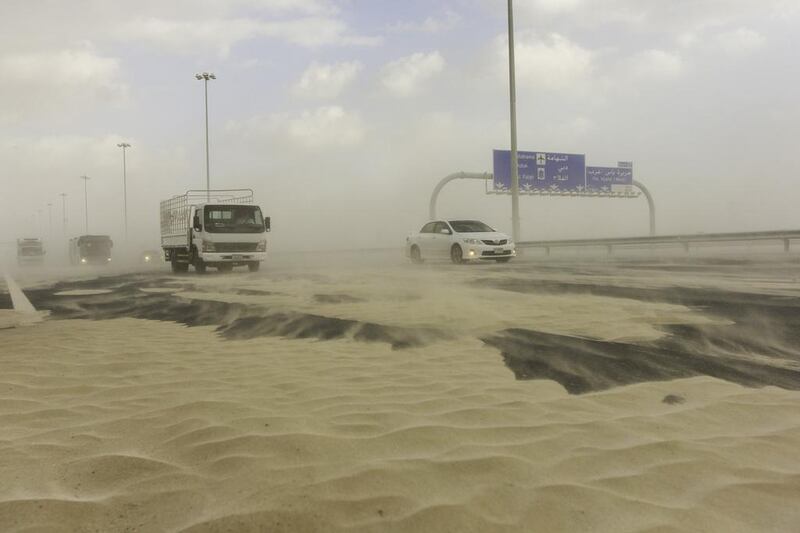 High winds drive sand across Sheikh Khalifa Bin Zayed Highway on Yas Island in Abu Dhabi on February 3, 2017. Winds were reported to have reached 75kph according to the National Centre of Meteorology & Seismology. Christopher Pike / The National