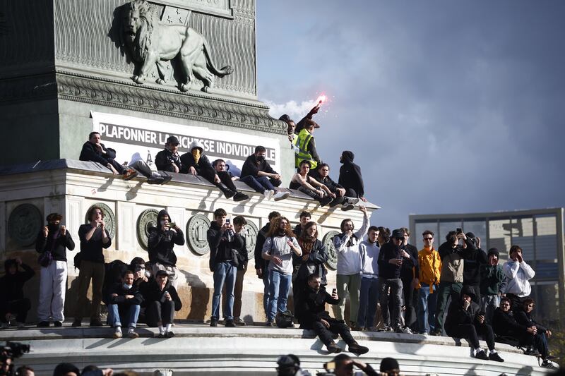 Demonstrators protest against the French government's pension reform in Paris. EPA