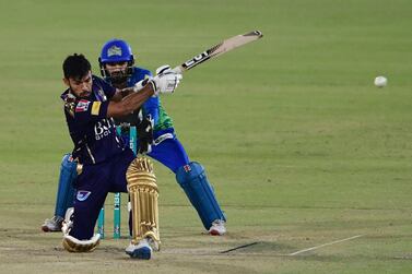 Quetta Gladiators' Usman Khan plays a shot during the Pakistan Super League (PSL) T20 cricket match between Quetta Gladiators and Multan Sultans at the National Stadium in Karachi on March 3, 2021. / AFP / Asif HASSAN