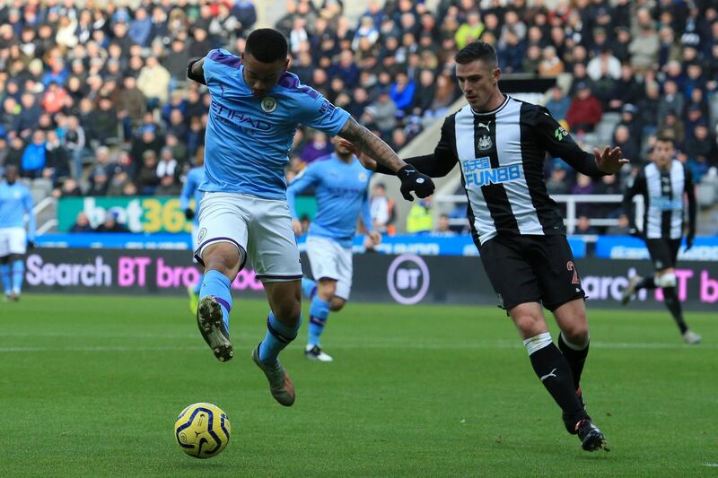 Manchester City's Brazilian striker Gabriel Jesus (L) vies with Newcastle United's Irish defender Ciaran Clark during the English Premier League football match between Newcastle United and Manchester City at St James' Park in Newcastle-upon-Tyne, north east England on November 30, 2019. (Photo by Lindsey Parnaby / AFP) / RESTRICTED TO EDITORIAL USE. No use with unauthorized audio, video, data, fixture lists, club/league logos or 'live' services. Online in-match use limited to 120 images. An additional 40 images may be used in extra time. No video emulation. Social media in-match use limited to 120 images. An additional 40 images may be used in extra time. No use in betting publications, games or single club/league/player publications. / 