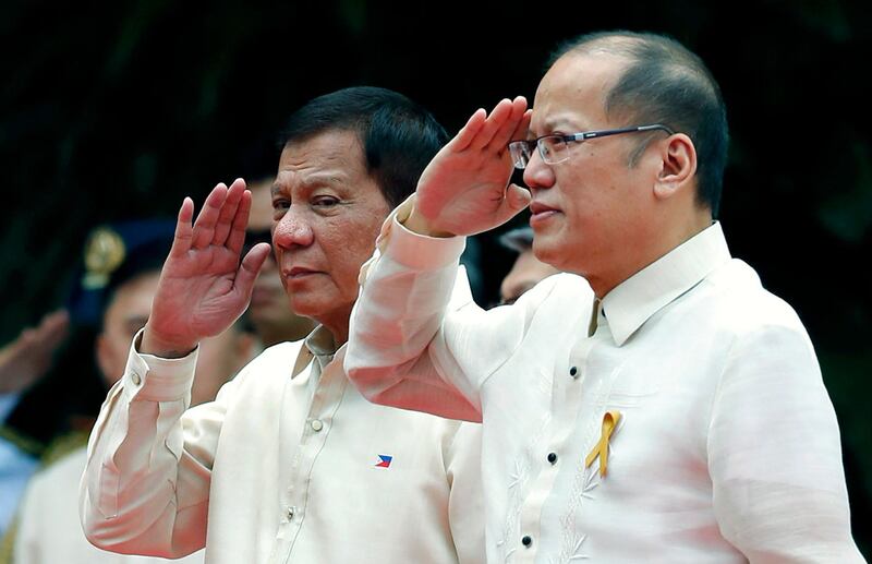 Filipino President Rodrigo Duterte, left, and predecessor Benigno Aquino at Duterte's inauguration ceremony at the Malacanang Presidential Palace grounds in Manila on July 30, 2016. EPA