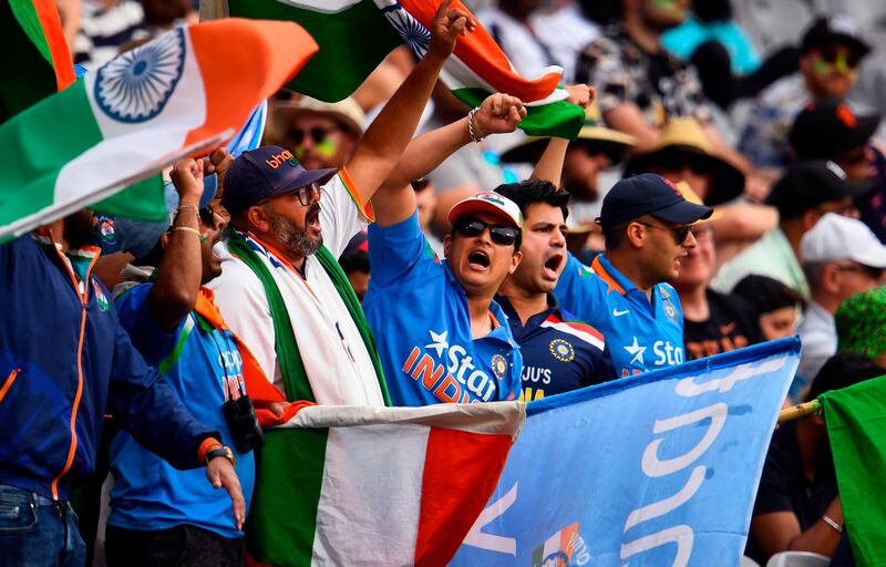 Indian fans cheer during the second day of the second cricket Test match between Australia and India at the MCG in Melbourne. AFP