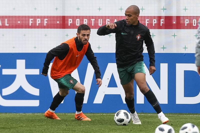 Joao Mario, right, and Bernardo Silva take part in a training session for Portugal. Paulo Novais / EPA