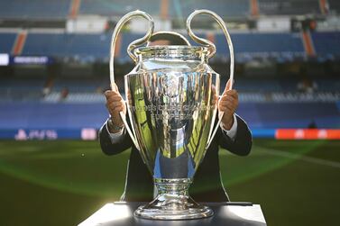 MADRID, SPAIN - MAY 04: A detailed view of the UEFA Champions League trophy is seen as it is placed on a plinth prior to the UEFA Champions League Semi Final Leg Two match between Real Madrid and Manchester City at Estadio Santiago Bernabeu on May 04, 2022 in Madrid, Spain. (Photo by Michael Regan / Getty Images)