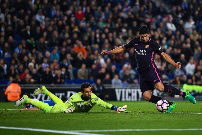 Luis Suarez of Barcelona scores his team’s third goal past Diego Lopez of Espanyol at the RCDE Stadium on April 29, 2017. Getty Images