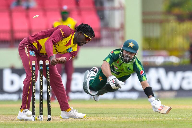 Mohammad Rizwan is run out for 46 by Hayden Walsh Jr. at Guyana National Stadium on Saturday.