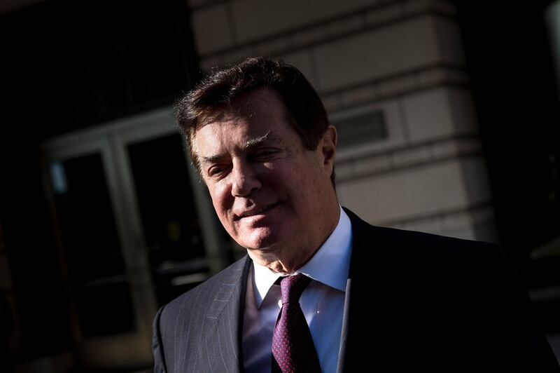 (FILES) In this file photo taken on December 11, 2017 former Trump campaign chairman Paul Manafort leaves Federal Court  in Washington, DC.
The US special prosecutor investigating Moscow's meddling in the 2016 presidential election on February 16, 2018 indicted 13 Russians for allegedly running a secret campaign to tilt the vote, prompting claims of vindication from President Donald Trump.The indictment -- which includes the first charges laid by special counsel Robert Mueller for election interference -- detailed a stunning operation launched in 2014 in a bid to sow social division in the US and influence American politics "including the presidential election of 2016." Four Trump campaign officials, including his campaign manager Paul Manafort and his national security advisor Michael Flynn, have already been indicted as part of Mueller's broader investigation. / AFP PHOTO / Brendan Smialowski