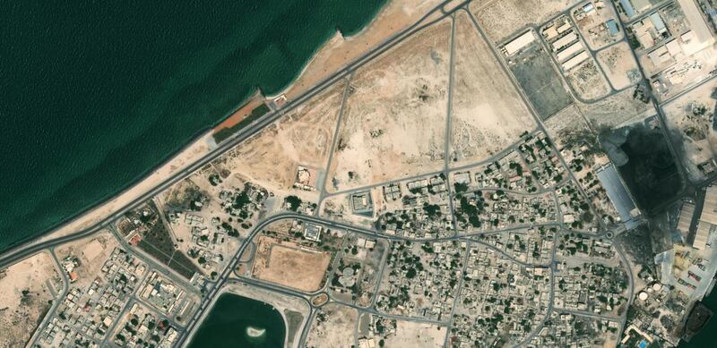 The Corniche Park in Umm Al Quwain (top) and Municipal Park on the bottom side of the image. Zoom Earth