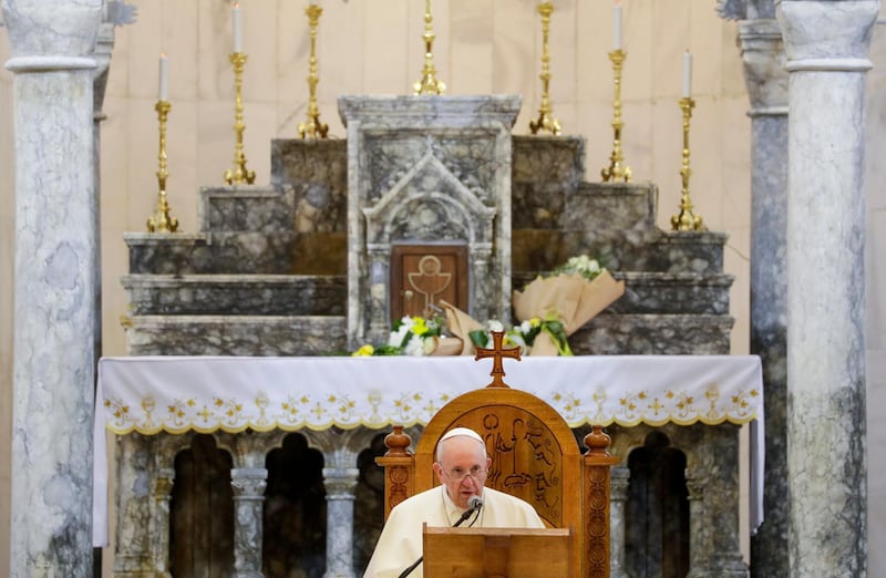 Pope Francis delivers his speech during a meeting with the Qaraqosh community at the Church of the Immaculate Conception, in Qaraqosh, Iraq, Sunday, March 7, 2021, The small Christian community returned to Qaraqosh after the war where they rebuilt their church that was used as a firing range by IS. (AP Photo/Andrew Medichini)