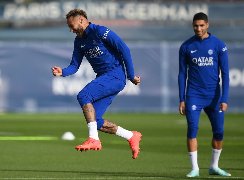 Neymar jokes around during a training session. AFP