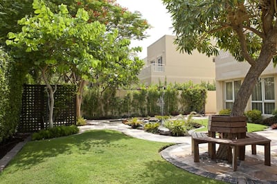 The greenery and spacious community areas are a draw in the Meadows community in Dubai. Antonie Robertson / The National