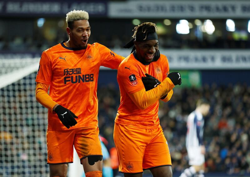 Joelinton celebrates with Allan Saint-Maximin during the FA Cup win at West Bromwich Albion. Reuters