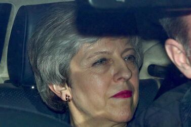 Theresa May leaves parliament after telling Conservative members she is prepared to step down. Reuters.  