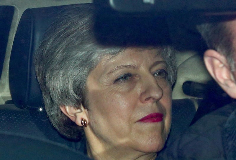 FILE PHOTO: Britain's Prime Minister Theresa May is seen in a car outside the Houses of Parliament in London, Britain, March 27, 2019. REUTERS/Hannah McKay/File Photo