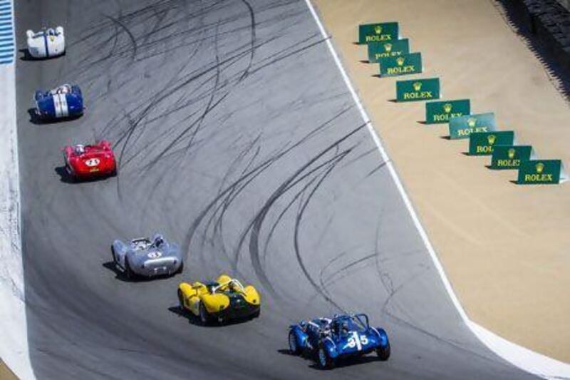 Race cars over 2500cc, from 1955-1961, race in the Rolex Monterey Motorsports Reunion at the Laguna Seca raceway. The 2013 event attracted 550 historic automobiles across a total of 16 classes. Stephan Cooper / AP Photo/Rolex