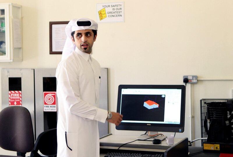 Mechanical engineer Fahad al-Musalam, 24, shows on a screen a design of a 3D printed World Cup stadium at a laboratory at Qatar University in Doha, Qatar June 16, 2016. REUTERS/Ibraheem Al Omari