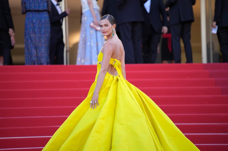 Noel Capri Berry wearing a gown by Ashi Studio, from Saudi designer Mohammed Ashi, attends the premiere of the film 'Aline' at the 74th international film festival, Cannes, southern France, July 2021.  AP