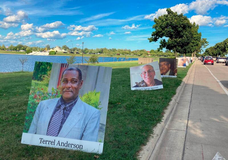 Hundreds of photos contributed by families have been staked at Belle Isle State Park in Detroit for a memorial drive to honor 1,500 city residents who have died from Covid-19. AP Photo