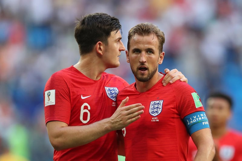 SAINT PETERSBURG, RUSSIA - JULY 14:  Harry Maguire of England speaks with Harry Kane of England after the 2018 FIFA World Cup Russia 3rd Place Playoff match between Belgium and England at Saint Petersburg Stadium on July 14, 2018 in Saint Petersburg, Russia.  (Photo by Catherine Ivill/Getty Images)