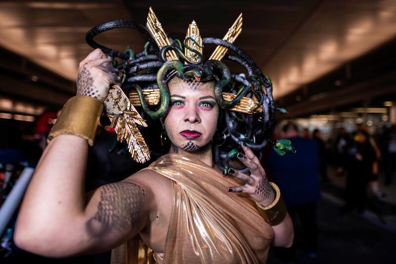 An attendee dressed as Medusa poses during New York Comic Con at the Jacob K. Javits Convention Center in New York.  AP