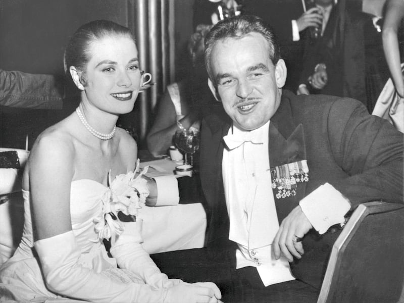 Princess Grace of Monaco and Prince Rainier III of Monaco arrive on June 01 1956 for the "Night in Monte Carlo" ball at the Waldorf-Astoria hotel in New York. Prince Rainier III married 18 April 1956 in Monaco US film actress Grace Kelly. AFP PHOTO INTERCONTINENTAL / AFP PHOTO / -