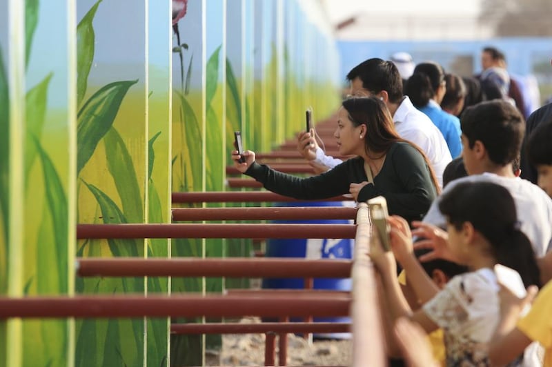 Visitors scramble to take photos of the various animals at the newly opened Rak Zoo in Ras Al Khaimah. Sarah Dea / The National