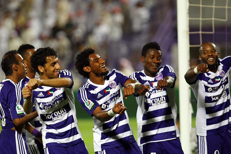 Al Ain, United Arab Emirates- April, 18,  2013:  (Second Right) Asamoah Gyan of Al Ain celebrates  with his teamates after the scoring hatrick goals against defeating  during the Etisalat Pro-League match  at the  Tahnon Bin Mohamed Stadium  in Al Ain .  (  Satish Kumar / The National ) For Sports