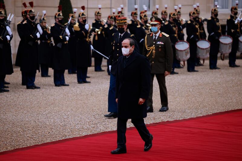 Egyptian President Abdel Fattah El Sisi reviews French troops upon his arrival at the Elysee Palace in Paris.  EPA