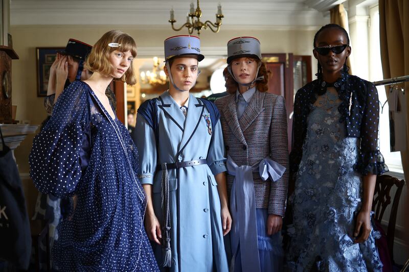 Models backstage ahead of the Bora Aksu runway show, which started with a minute's silence. Reuters