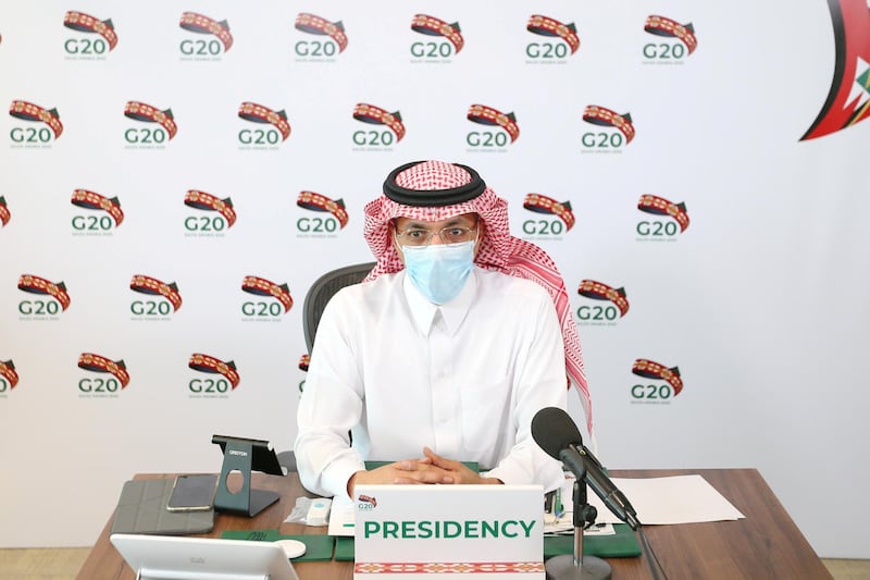Saudi Minister of Finance Mohammed al-Jadaan wears a protective mask as he attends a virtual meeting of G20 finance ministers and central bank governors in Riyadh, Saudi Arabia July 18, 2020.  G20 Saudi Arabia/Handout via REUTERS ATTENTION EDITORS - THIS PICTURE WAS PROVIDED BY A THIRD PARTY.