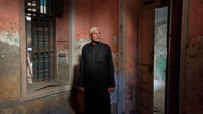 Caretaker Mahrouz Saber inside a room in a 19th century building located near the Taz Palace in Islamic Cairo. Co-owner Shahira Mehrez would like to turn the structure into a boutique hotel but faces many challenges. Dana Smillie for The National