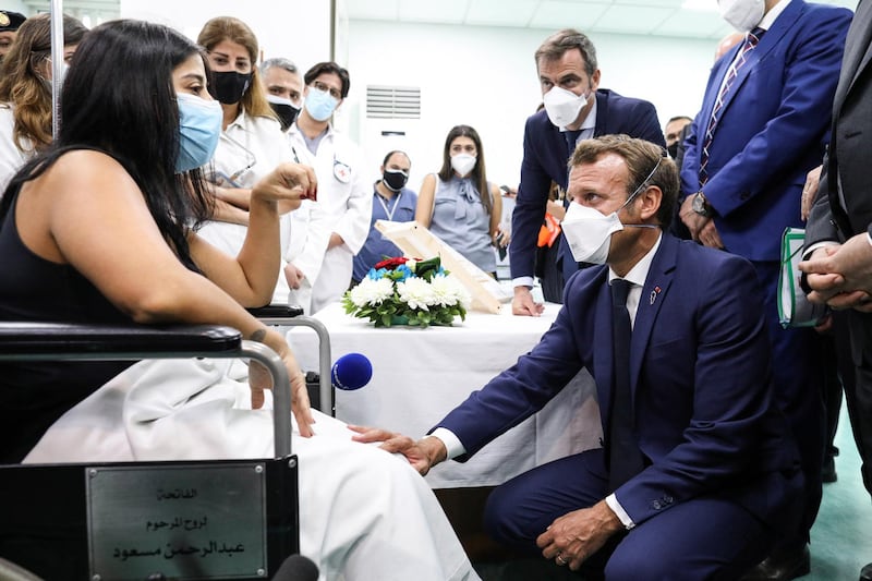 French President Emmanuel Macron, flanked by French Health Minister Olivier Veran visit the Rafik Hariri University Hospital in Beirut, Lebanon.  EPA