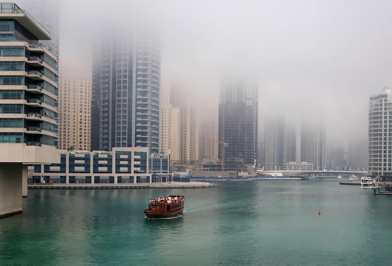 Dubai, March 15, 2013 - Afternoon fog descends on Dubai Marina in Dubai, March 15, 2013. (Photo by: Sarah Dea/The National)