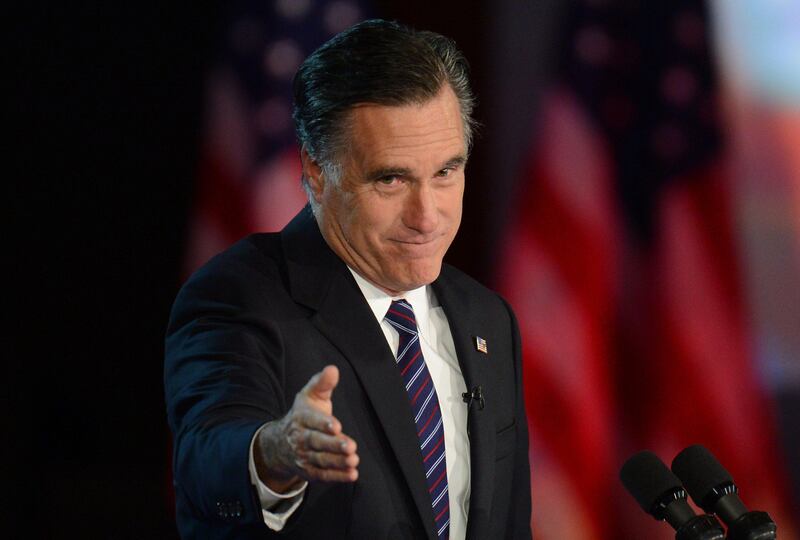 US Republican presidential candidate Mitt Romney arrives on stage to concede the election to President Barack Obama on November 7, 2012 in Boston. Obama swept to re-election, forging history again by transcending a slow economic recovery and the high unemployment which haunted his first term to beat Romney.    AFP PHOTO/Don EMMERT
 *** Local Caption ***  837826-01-08.jpg