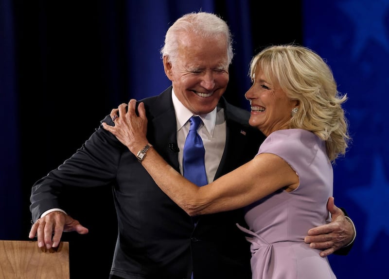 WILMINGTON, DELAWARE - AUGUST 20: : Democratic presidential nominee Joe Biden greets his wife Dr. Jill Biden on the fourth night of the Democratic National Convention from the Chase Center on August 20, 2020 in Wilmington, Delaware. The convention, which was once expected to draw 50,000 people to Milwaukee, Wisconsin, is now taking place virtually due to the coronavirus pandemic.   Win McNamee/Getty Images/AFP