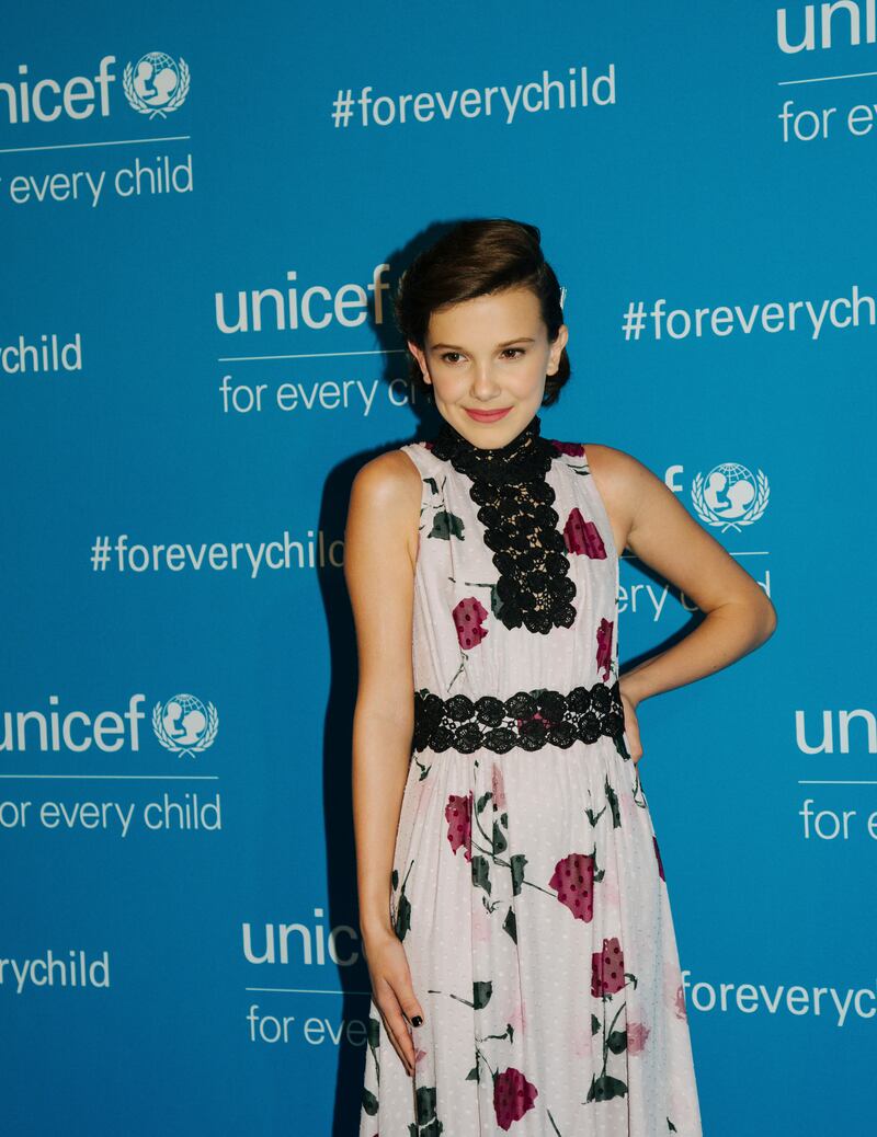 Millie Bobby Brown, wearing a floral Kate Spade dress, attends the 70th Unicef Anniversary at the United Nations Headquarters in New York on December 12, 2016. EPA