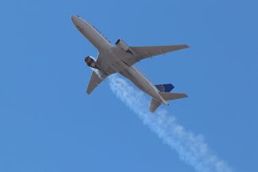 A photo provided by Instagram user Hayden Smith (speedbird5280) shows United Airlines flight 328 (Boeing 777-200, tailnumber N772UA) with an engine on fire, near Denver, Colorado, USA, 20 February 2021. EPA