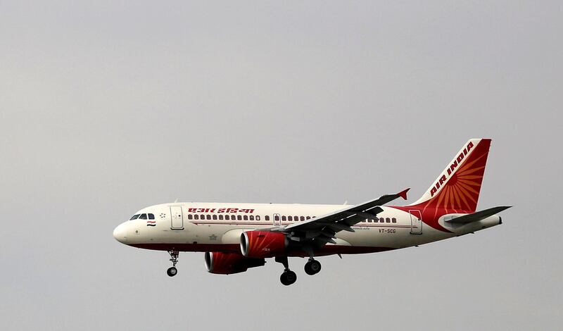 An Air India plane prepares to land at Indira Gandhi International airport in New Delhi on April 16, 2015. Altaf Qadri / AP