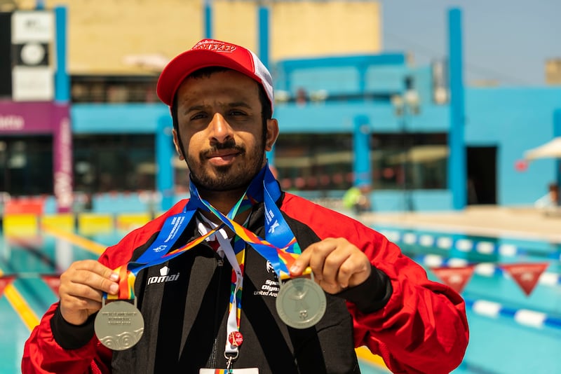 Awadh Al Ketbi wins silver in the 50-metre backstroke and freestyle competitions. 