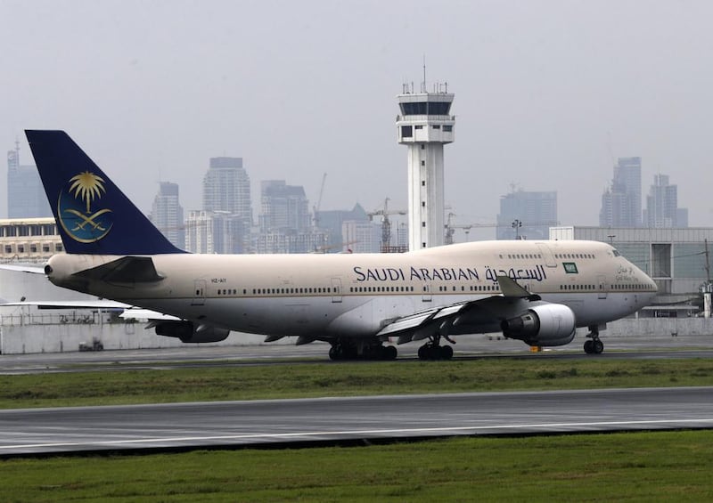 A Saudi Arabian Airlines plane at Manila's international airport, Philippines. The carrier plans to buy scores of new aircraft as it modernises its fleet. Francis R Malasig / EPA