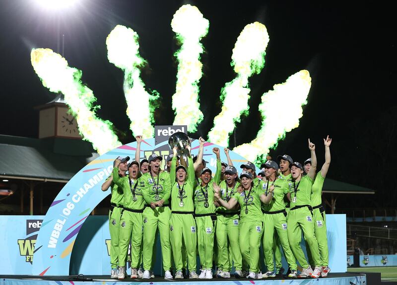 Sydney Thunder celebrate winning the Women's Big Bash League after beating Melbourne Stars in the final at North Sydney Oval, on Saturday, November 28. Getty
