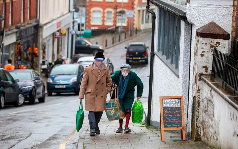 A couple go shopping in Knighton. The town has 3,000 residents. AFP