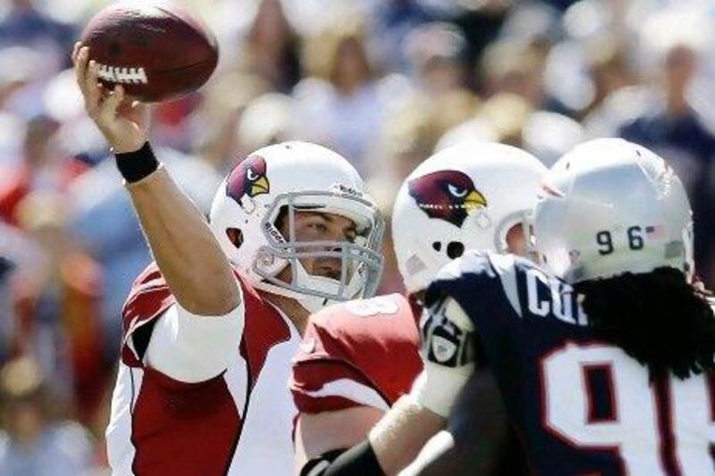 Finding success in the first two games of the season, Arizona's Kevin Kolb, left, has been in the NFL long enough to not get too up when things are going well or too down when it all goes wrong.