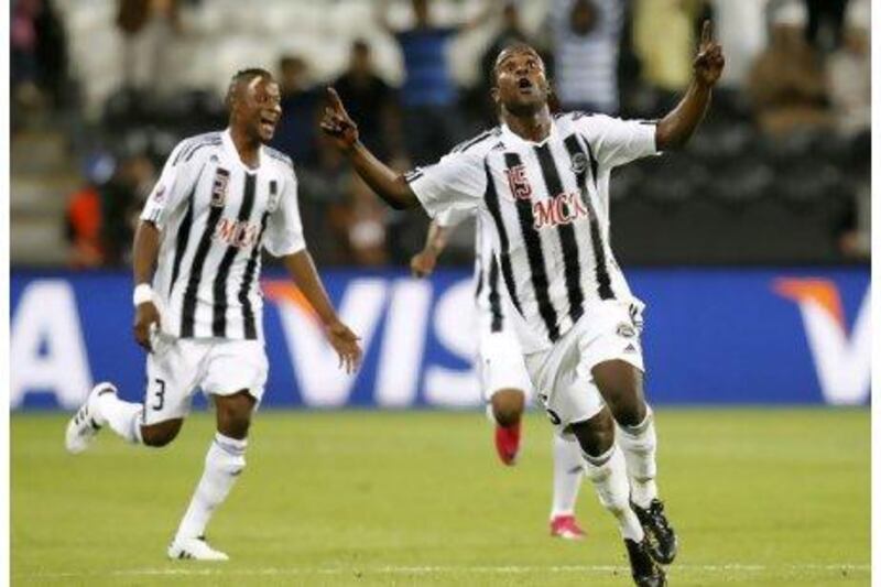 TP Mazembe’s Kiritcho Kasusula, right, celebrates after his side’s 2-0 victory over Internacional on Wednesday that booked their place in tomorrow’s final.