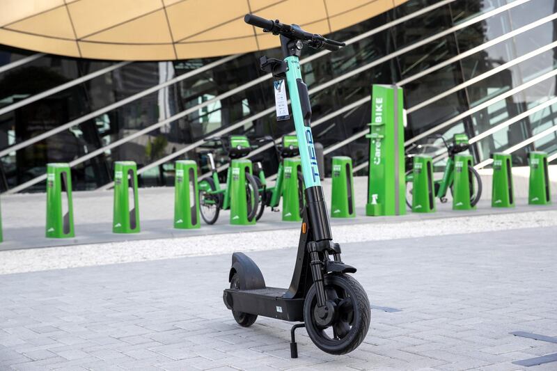 DUBAI, UNITED ARAB EMIRATES. 26 OCTOBER 2020. E-scooter trials rolled out in five areas across city for a year long project for commuters to rent and use e-scooters while commuting to and from tram and metro stations. A TIER e-scooter for rent at the DMCC Metro Station in JLT. (Photo: Antonie Robertson/The National) Journalist: Kelly Clarke. Section: National.
