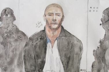 This file court drawing shows Mehdi Nemmouche (C), during a court hearing in Versailles, France. AFP