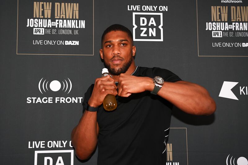 Anthony Joshua poses for a photo at the launch party for his upcoming bout against Jermaine Franklin at Battersea Power station on March 27, 2023 in London, England. Getty Images
