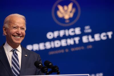 U.S. President-elect Joe Biden smiles as he speaks about health care and the Affordable Care Act (Obamacare) at the theater serving as his transition headquarters in Wilmington, Delaware, U.S., November 10, 2020. REUTERS/Jonathan Ernst