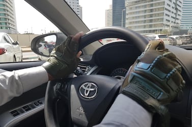 The driving gloves are becoming popular with Abu Dhabi drivers. Picture by Saeed Saeed